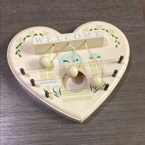 Heart-Shaped Cream and Green  Welcome Sign Wall